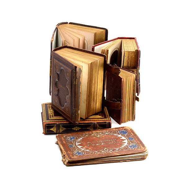Five Miniature Victorian Photograph Albums: Five Miniature Victorian Photograph Albums: Comprising a leather bound album titled "Amanda", containing ten family photographs and small cards; a fabric album with painted medallion containing forty 