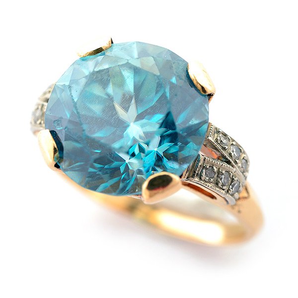 Zircon, Diamond, 14k Yellow Gold Ring.: Zircon, Diamond, 14k Yellow Gold Ring. Featuring one round-cut zircon weighing approximately 8.50 cts., flanked by twelve full-cut diamonds weighing a total of approximately 0.10 cttw., set in a 14k y