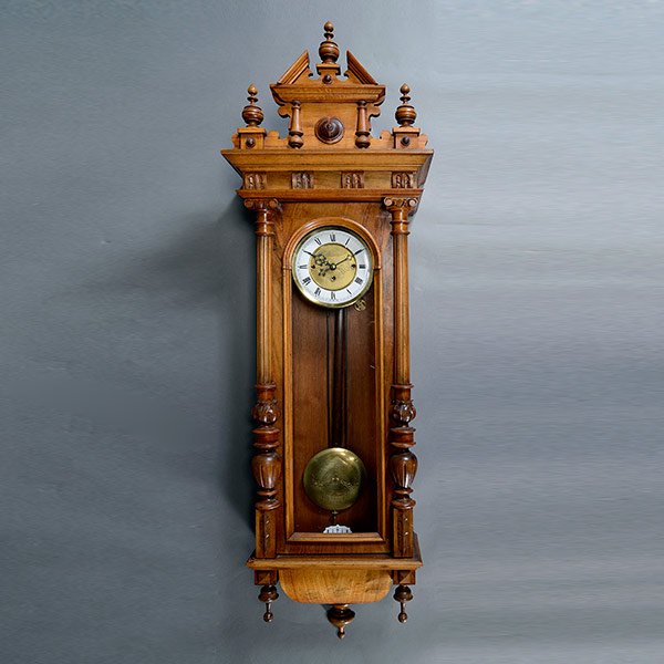 Viennese Regulator Wall Clock: Viennese Regulator Wall Clock, The rectangular form with a broken pediment cornice, Ionic columnar and vasiform stiles adorsing an arch glazed cabinet,revealing the matching brass dial and a brass pen