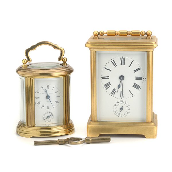 Two Gilt Brass Carriage Clocks: Two Gilt Brass Carriage Clocks, Comprising one French, with key {height 4 1/4 inches}, and one English by Mathew Norman {height 3 inches}