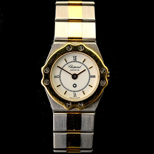 Chopard St. Moritz Gold, Steel Wristwatch.: Ladies Chopard St. Moritz 18k Yellow Gold, Steel Wristwatch. DIAL: Round, white, applied gold baton and black Roman numeral hour markers, inner black minutes track, Chopard, Geneve. MOVEMENT: Quartz.