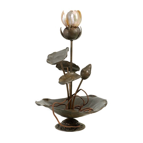 Copper Lotus Lamp With Abalone Shade In The Style Of: Copper Lotus Lamp With Abalone Shade, In The Style Of Elizabeth Burton. Height 22 inches.