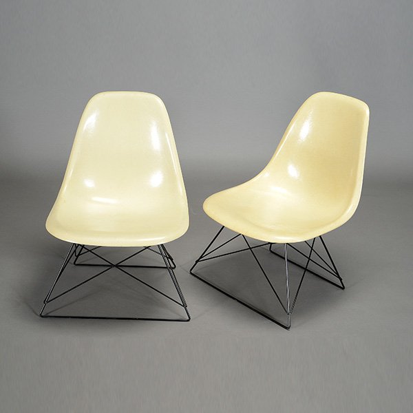 2 Eames Cat's Cradle Side Chairs.: Two Charles & Ray Eames Cat's Cradle Side Chairs. Height 25 3/4 inches, Width 18 1/2 inches.