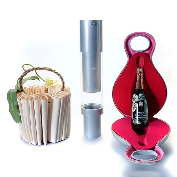 3 Haute Tote Champagne Carriers.: Three Haute Tote Champagne Carriers Created For House & Garden 2004 Charity Auction. Designers Karim Rashid, Patrick Jouin and Rick Lee. Height 24 inches, 18 inches and 16 inches.