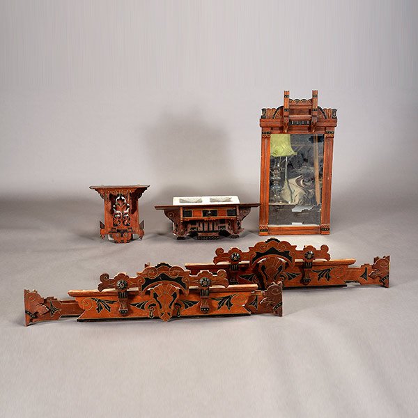 Collection of Aesthetic Movement Carved Decorations: Collection of Aesthetic Movement Carved Decorations: Comprising two valences {Maximum length 72 1/2 inches}, two hanging shelves, and mirror {dimensions 33 1/2 x 18 inches} (5)