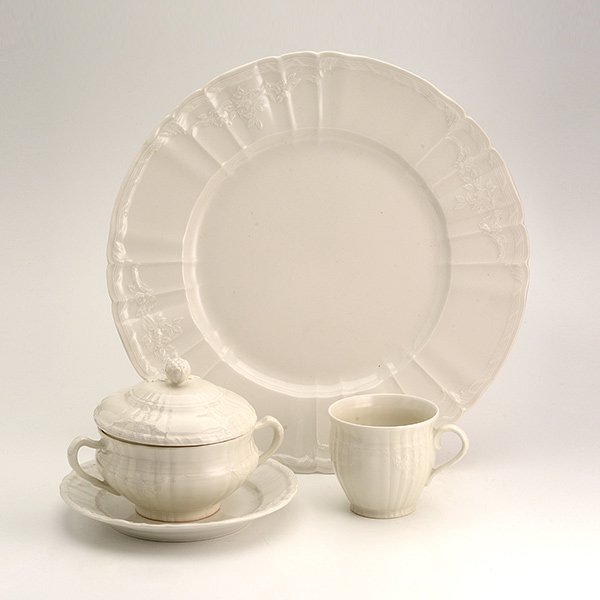 Suite of KPM Berlin Rocaille Porcelain Dinnerware: Suite of KPM Berlin Rocaille Porcelain Dinnerware, each piece with Sceptre mark: Comprising twelve dinner plates {diameter 11 inches}; twelve covered soup cups; twelve undertrays; and one demitasse cu