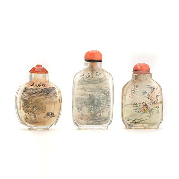 3 Inside-Painted Rock Crystal Snuff Bottles, Early 20th: Three Inside-Painted Rock Crystal Snuff Bottles The first features two figures crossing a bridge to arrive at a retreat, the reverse depicting four goldfish in a lotus pond; the second features boys a