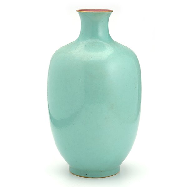 A Turquoise-Glazed Eggshell Porcelain Vase, Qianlong: A Turquoise-Glazed Eggshell Porcelain Vase Of elongated ovoid shape with a narrow flaring neck, raised upon a short foot, the recessed circular base bearing a six-character mark in underglaze blue. Qi