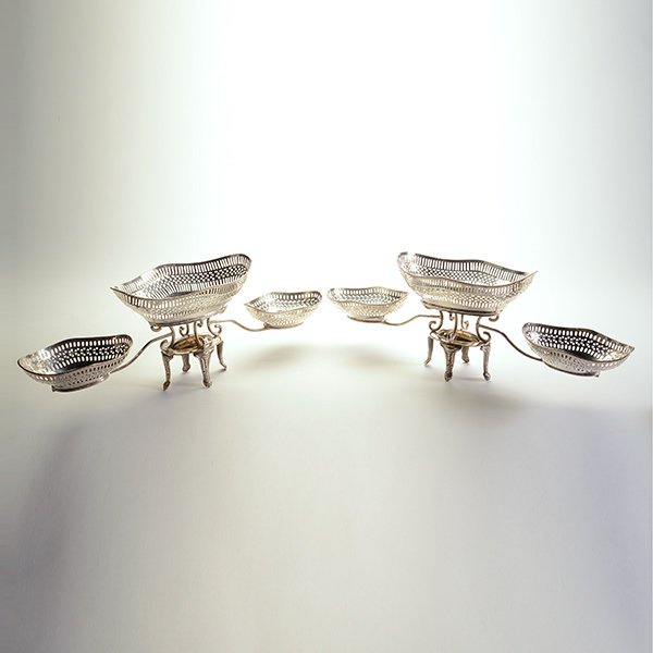 Pair of Sheffield Plated Three Tiered Epergnes: Pair of Sheffield Silver Plated Three Tiered Epergnes, each with three removable reticulated baskets {Height 10; width 27 inches}
