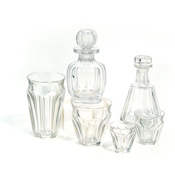 Suite of Baccarat Crystal Glasses and Table Articles: Suite of Baccarat Tallyrand Crystal Glasses and Table Articles: Comprising eleven water glasses {height 5 1/4 inches}; six tumblers {height 3 3/8 inches}; six cordials; and seven shot glasses; togethe