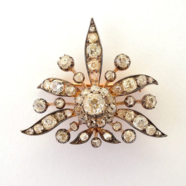 Georgian Diamond, Silver-Topped, 14k Yellow Gold: Georgian Diamond, Silver-Topped, 14k Yellow Gold Brooch. Centering one old mine-cut diamond weighing approximately 0.50 ct., accented by numerous old mine-cut, old European-cut and rose-cut diamonds w