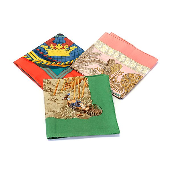 Collection of Three Hermes Silk Scarves.: Collection of Three Hermes Silk Scarves. Including "Grande Tenue," 1985, by artist Henri d'Origny, red ground, green border; "Sichuan," 1995, by Robert Dallet, mint ground, green border together with 