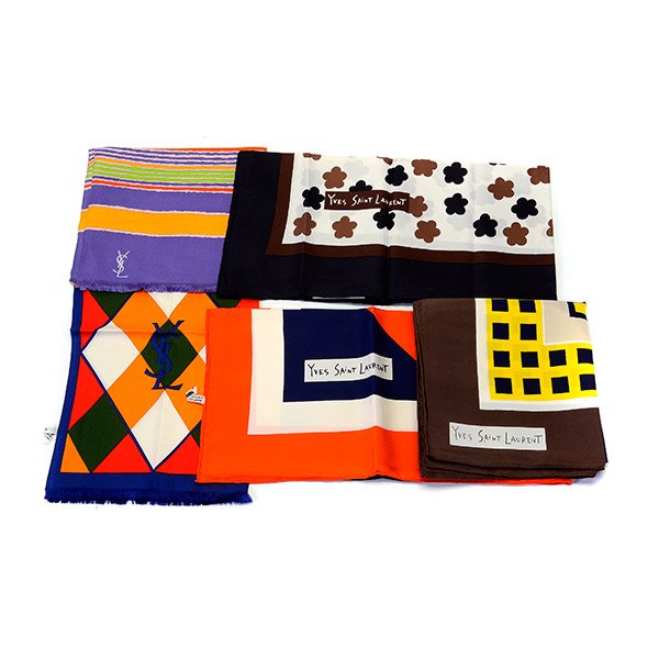 Collection of Five Vintage Yves St. Laurent Silk: Collection of Five Vintage Yves St. Laurent Silk Scarves. Including a geometric floral print, white ground, black border with brown accents, measuring approximately 32 inches square; a geometric desig