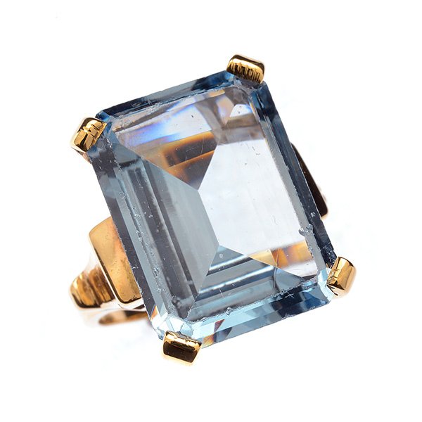 Synthetic Spinel, 10k Yellow Gold Ring.: Synthetic Spinel, 10k Yellow Gold Ring. Featuring one European-cut synthetic spinel weighing approximately 19.60 cts., set in a 10k yellow gold mounting. {Size 8 1/2, Gross Weight: 6.2 dwts}