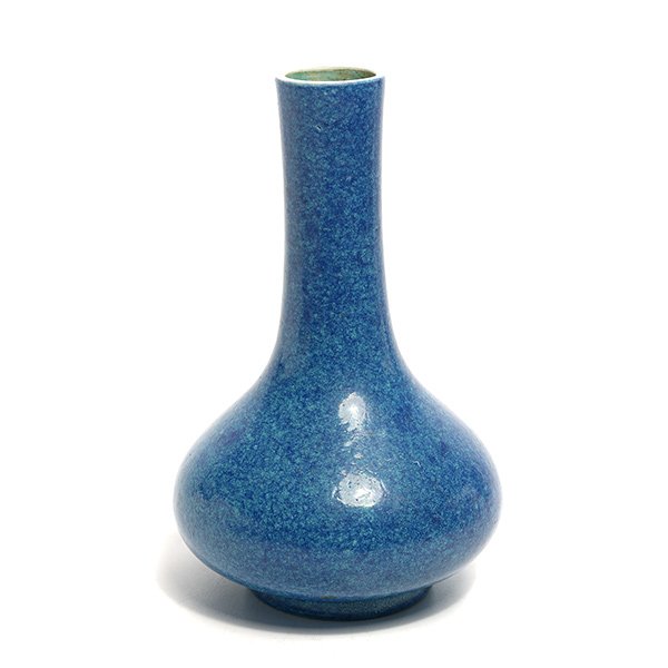 A Robin's Egg Glazed Bottle Vase, 19th Century: A Robin's Egg Glazed Bottle Vase The compressed globular body resting on a circular foot, bearing an impressed Qianlong six-character mark. 19th Century {Height: 6 5/8 inches (16.8 cm)}