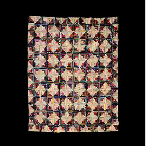 Silk Pieced Log Cabin Quilt: Silk Pieced Log Cabin Quilt, lined with fan and butterfly motif cotton backing, made by Jane Quay Penn, age 73, found in San Francisco {Dimensions 63 x 73 inches} [Very fragile; fair condition] [Comes
