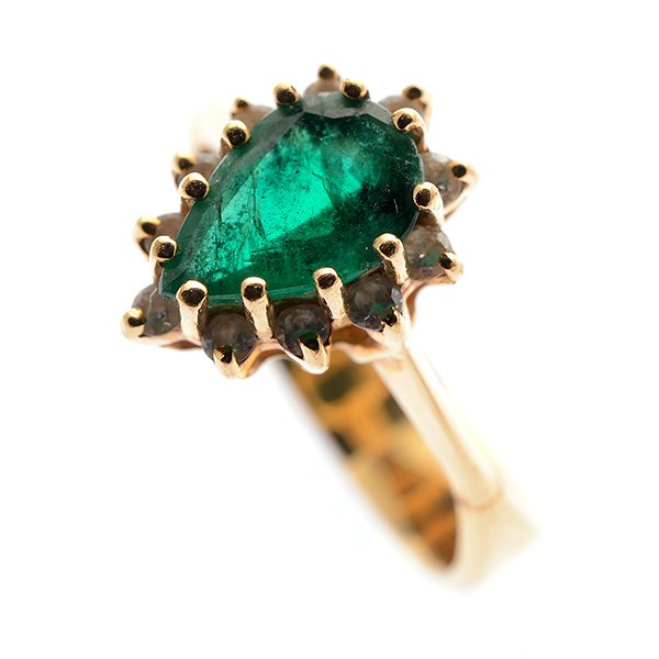 Emerald, Diamond, 14k Yellow Gold Ring.: Emerald, Diamond, 14k Yellow Gold Ring. Centering one pear-cut emerald weighing approximately 0,80 ct., surrounded by eleven full-cut diamonds weighing a total of approximately 0.10 cttw., set in a 14