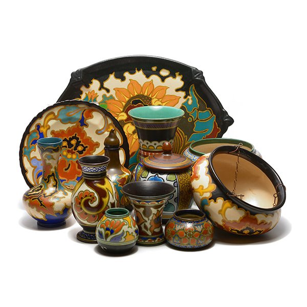 Large Collection of Gouda Pottery: Large Collection of Gouda Pottery: Comprising a Rosario hanging jardiniere and plate; Arnhem tray {dimensions 16 x 11 inches}; Candia jardiniere; Zenith jar; Desire trumpet form vase; Sydney jar; Asa