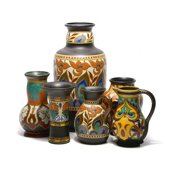 Six Pieces of Gouda Pottery: Six Pieces of Gouda Pottery, Including a large Gondel vase {height 16 1/2 inches} and pitcher; Regina urn; Plazuid pitcher; Betty vase; and a Trix trumpet form vase