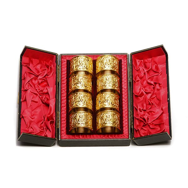 Set of Eight Rococo Revival Style Napkin Rings: Cased Set of Eight Rococo Revival Style Gilt Bronze Napkin Rings {Height of each 1 1/2 inches; diameter 2 inches}