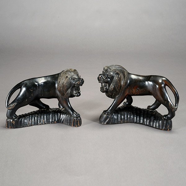 Pair of Ebonized Carved Wood Lion Figures: Pair of Ebonized Carved Wood Lion Figures {Height 11 1/2 inches; length 17 inches}