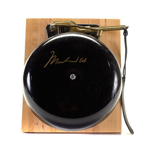 Ring Bell Autographed by Muhammad Ali: Ring Bell Autographed by Muhammad Ali, mounted on board {Diameter of bell 12 inches}