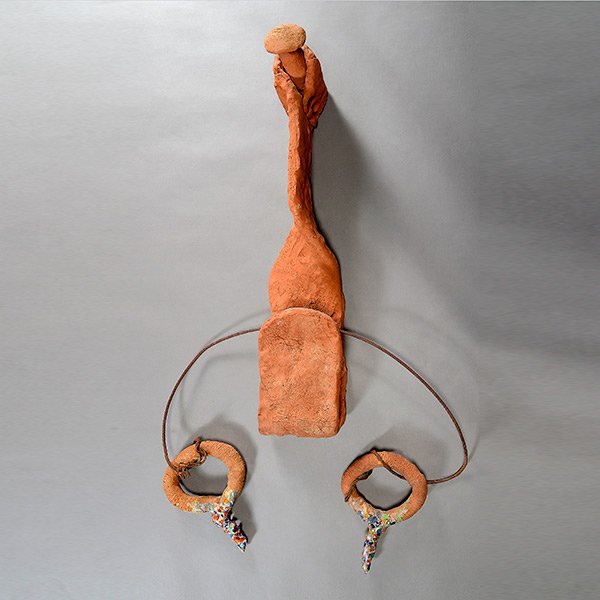 ROBERT ARNESON "Earth Hangup" Sculpture: ROBERT CARSTON ARNESON (California 1930-1992) Earth Hangup, 1971 Terracotta, glaze and metal wire Nail with hook measures: 38 x 8 inches / 96.52 x 20.32 cmEach glazed eyelet measures: 8 x 12 inches /