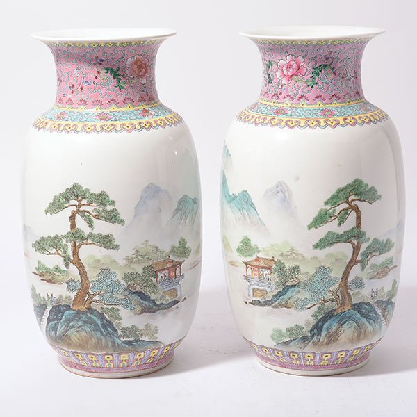 A Pair of Famille Rose Vases: A Pair of Famille Rose Vases Both hand printed and hand painted to the exterior with figures within a lush landscape of mountains and water, reversed by and inscriptions and three seals, both with a s