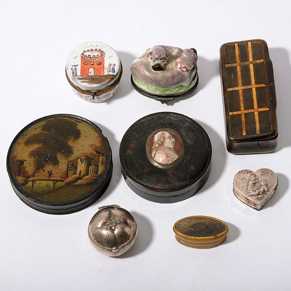 Collection of Eight Snuff or Pill Boxes: Collection of Eight Snuff or Pill Boxes: Comprising a tortoise shell box mounted with shell cameo of Dante; a papier mache box painted with a country scene; two horn and bone boxes; a Battersea type e