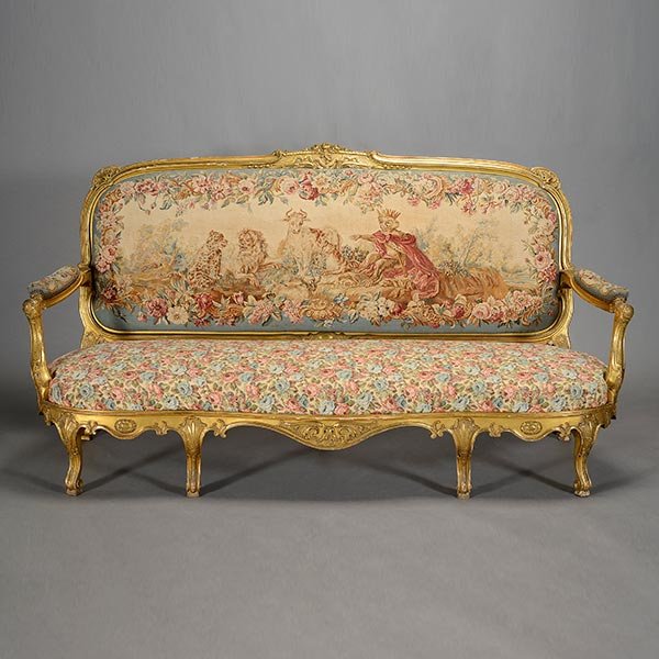 Louis XV Style Carved and Giltwood Canape with: Louis XV Style Carved and Giltwood Canape with Tapestry Upholstery Featuring A Singerie Figure of A Monkey King, Late 19th Century {Dimensions 44 x 84 x 27 inches}