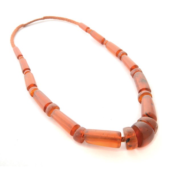 India Hill Tribes Amber Necklace.: India Hill Tribes Amber Necklace. A long crown knotted necklace of antique Burmese amber beads, restrung in its original format.