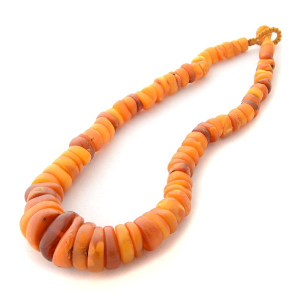 Amber Bead Necklace.: Amber Bead Necklace. A necklace of antique Baltic amber beads. These may be either Fulani (from West Africa) or Himalayan, completed by a macramÃˆ closure.