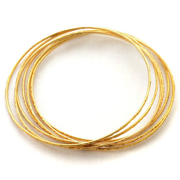 Collection of Seven 18k Yellow Gold Bracelets. (1 of 3)