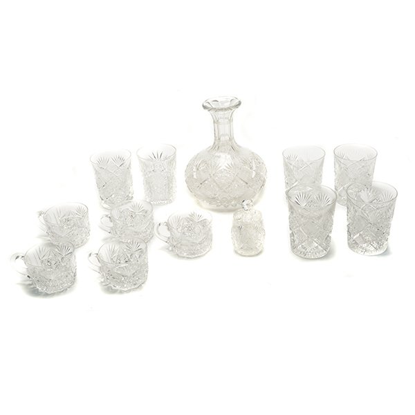 Collection of American Brilliant Cut Glass: Collection of American Brilliant Cut Glass, Including a carafe and five matching tumblers, set of five punch cups, jar, and a signed Libby cup (13) {Height of carafe 7 1/2 inches; height of Libby cup 