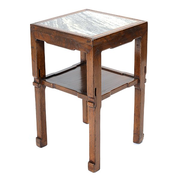 A Nanmu Flower Stand: A Nanmu Flower Stand Of square form, the top with a black and white marble inset and a single shelf below, the aprons incised with bamboo leaves, raised upon square-form legs with hoof feet. {29 x 18 