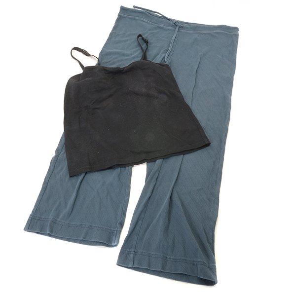 Jody Foster's Panic Room Movie Outfit: Jody Foster's Panic Room Movie Outfit, worn by her character Meg Altman, including DKNY black tanktop, and gray athletic pants, with certificate of authenticity from Reel Clothes and Props