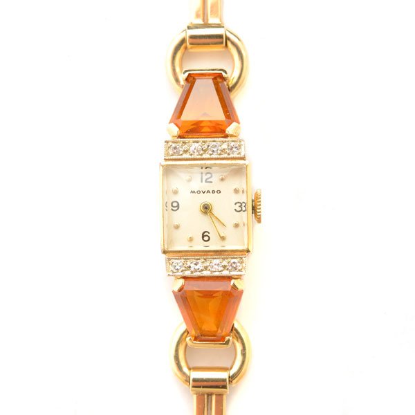 Ladies Retro Movado Citrine, Diamond, 14k Yellow Gold: Ladies Retro Movado Citrine, Diamond, 14k Yellow Gold Wristwatch. DIAL: Square, cream, black Arabic hour markers for 12, 3, 6 and 9 o'clock, gold dot hour markers, gold baton hands, Movado. MOVEMENT: 