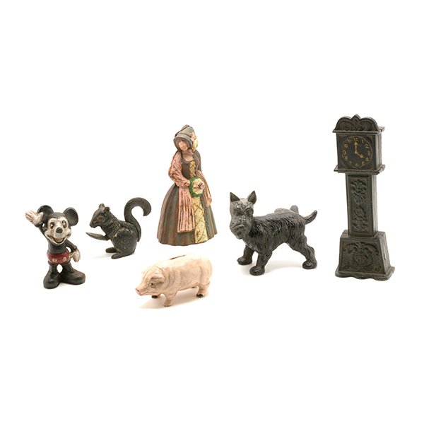 Collection of Six Cast Iron Banks or Figures: Collection of Six Cast Iron Banks or Figures: Comprising a squirrel nut cracker, a scottie figure door stop, and four banks including a figure of a lady, Mickey Mouse, a pig, and a grandfather clock {