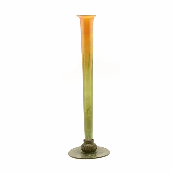 Tiffany Studios Bronze Mounted Favrile Glass Trumpet: Tiffany Studios Bronze Mounted Favrile Glass Trumpet Form Vase. The vasiform insert in gold iridescent glass over a pulled leaf tip border, the interior of the ruffle rim with gold stretch iridescence