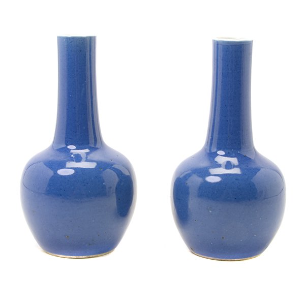 A Pair of Cobalt Blue Glazed Vases, 19th Century: A Pair of Cobalt Blue Glazed Vases Both of globular form with a bottle neck, covered in a translucent cobalt glaze except for the interior and the recessed base. 19th Century {Height: 7 1/4 inches (18
