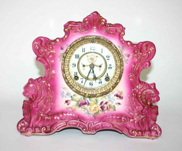 Rare Royal Bonn Ansonia Clock with Griffins with ori: Rare Royal Bonn Ansonia Clock with Griffins with original Open Escapement Movement. 12"h x 14"w x 6"d Excellent condition, with no chips or cracks Great Pink Color