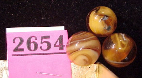 Three Root Beer 9 Marbles: Three Root Beer 9 Marbles. Machine Made.