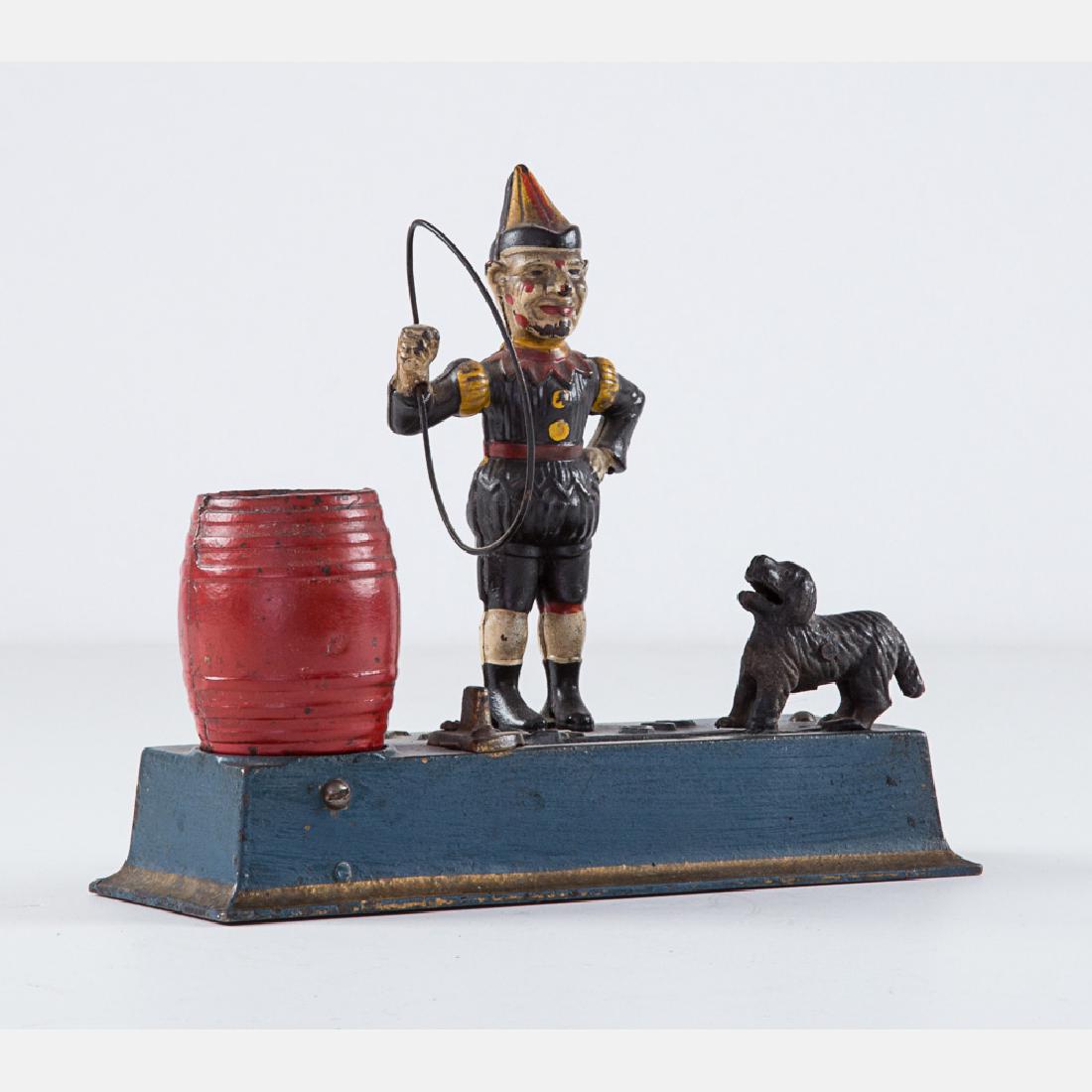 A Cast Iron Trick Dog Mechanical Bank Manufactured by (1 of 4)