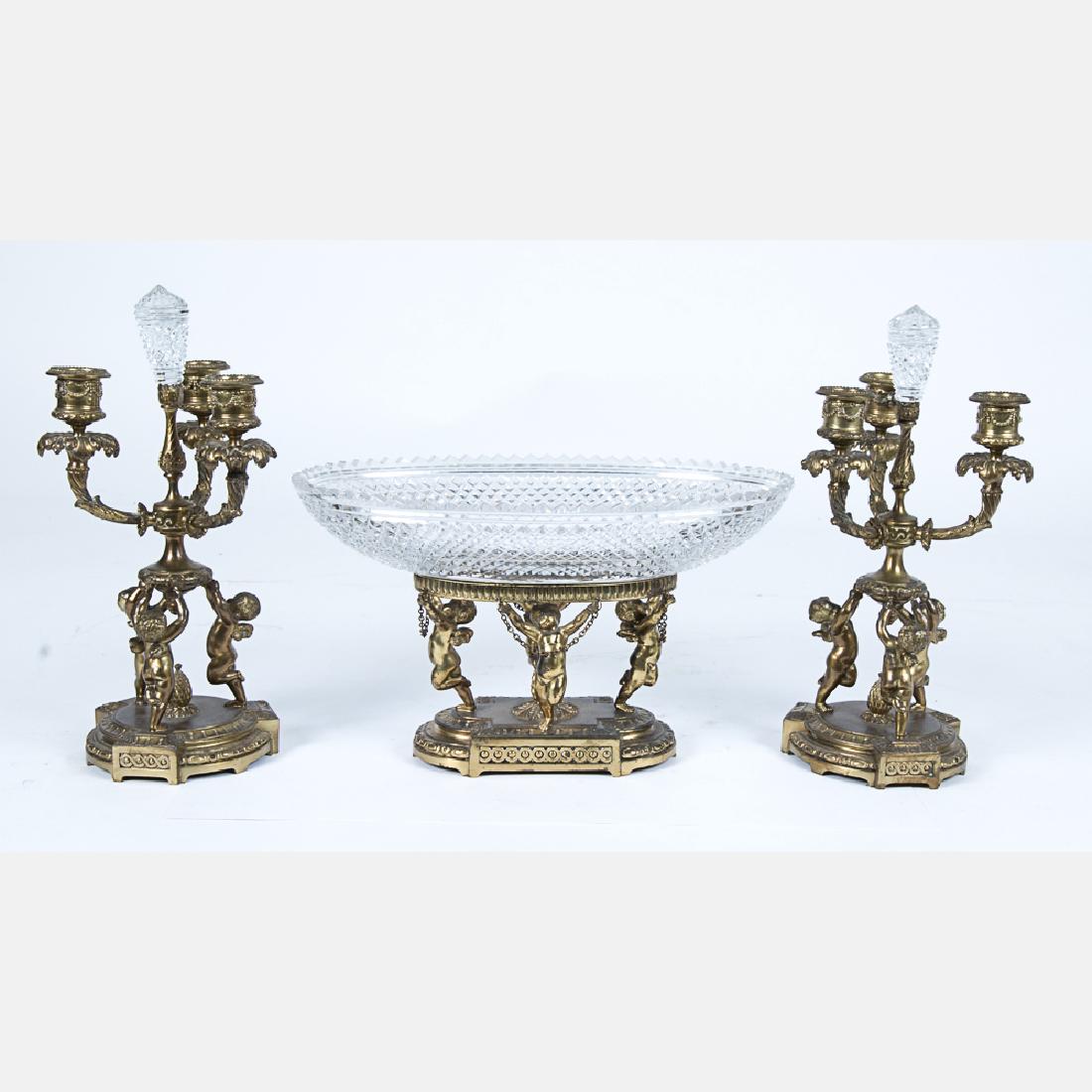 A Pairpoint Gilt Metal, Pressed and Cut Glass Garniture (1 of 4)