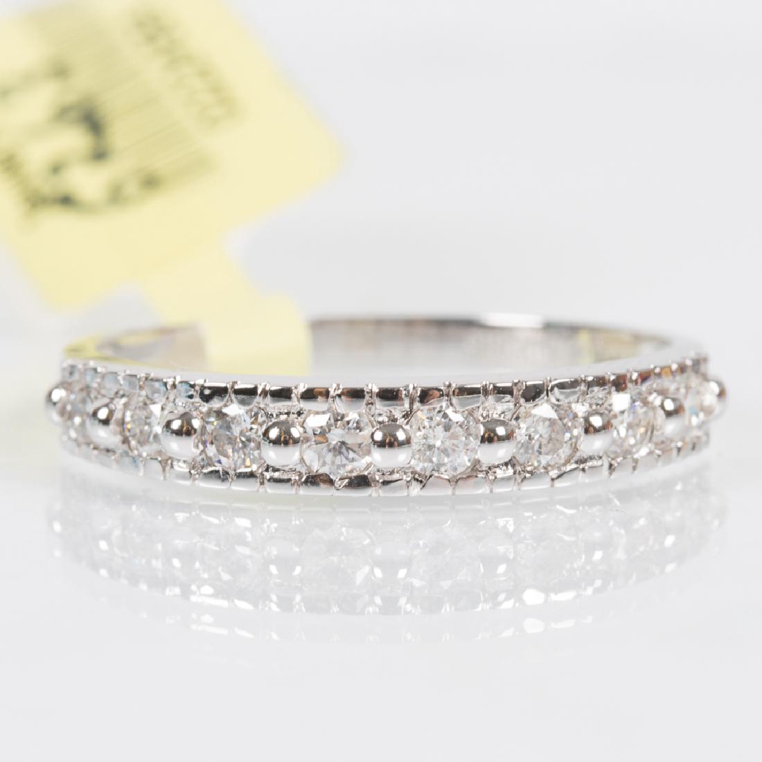 A 14kt. White Gold and Diamond Ring, (1 of 3)