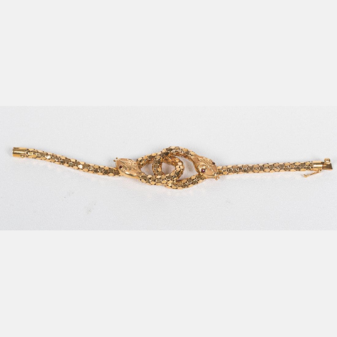 An 18kt. Yellow Gold Snake Bracelet. (1 of 3)