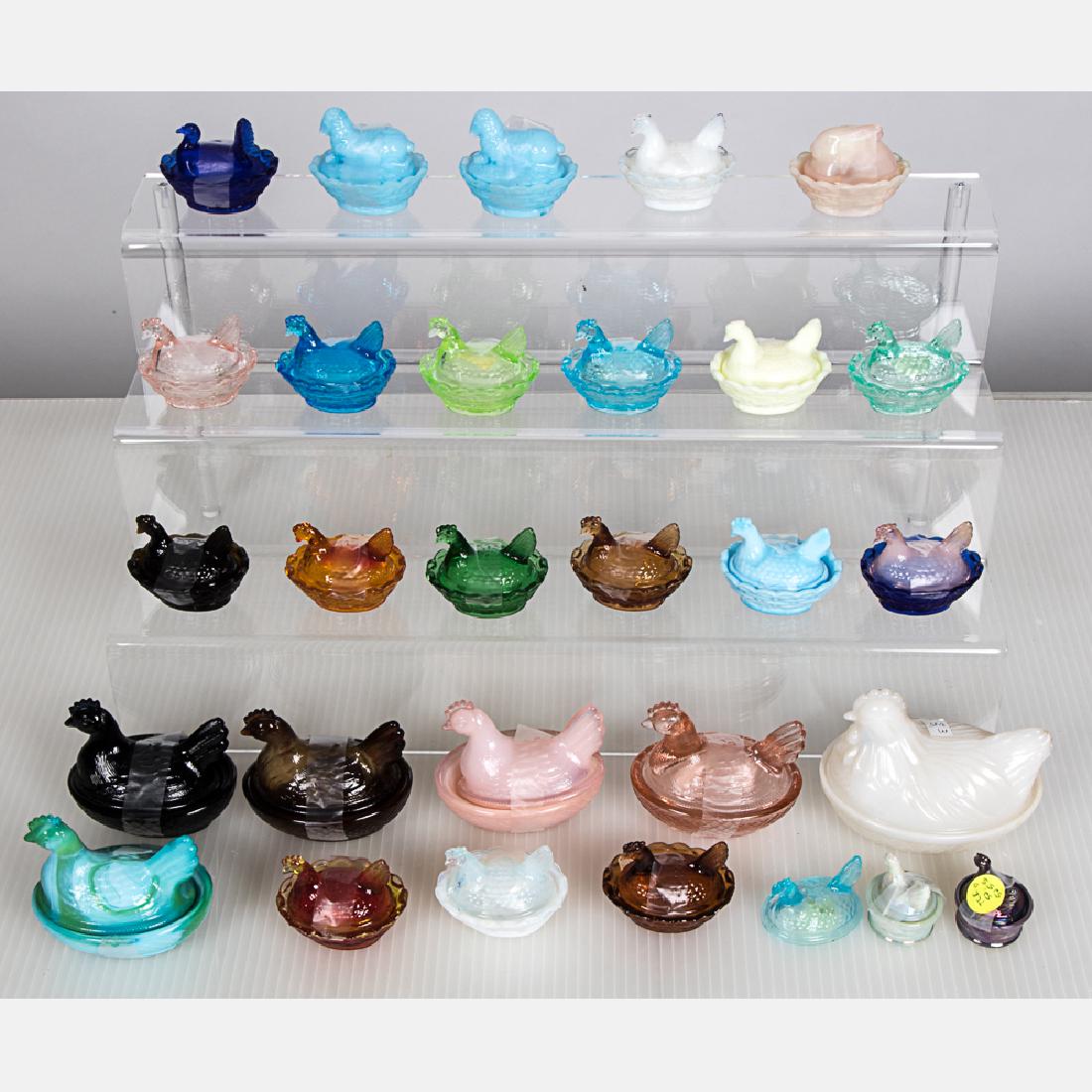 A Collection of Molded and Pressed, Colored Glass: A Collection of Molded and Pressed, Colored Glass Animal Form Boxes and Salt Cellars by Various Makers, 20th Century, Including pieces by Degenhart Glass, Boyd's Crystal Art Glass and Hazel Atlas. Lar