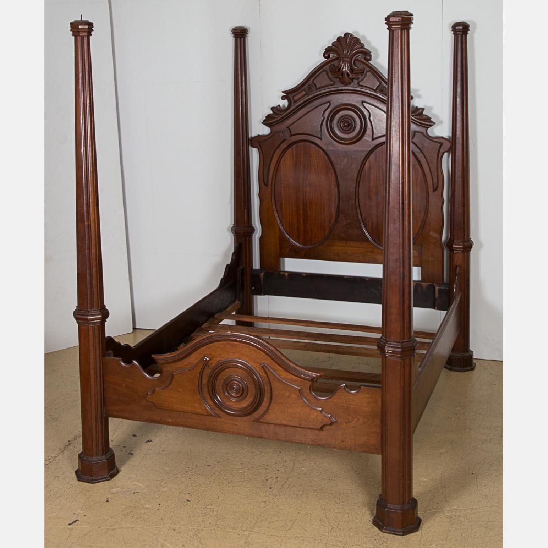An American Victorian Carved Mahogany Four Poster Bed,