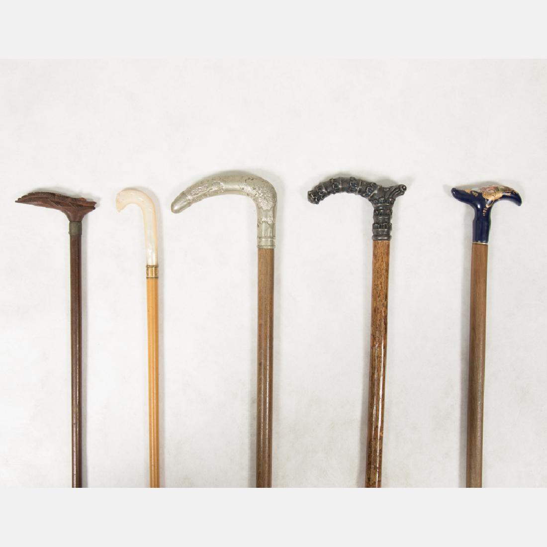 A Group of Five Painted and Carved Wood, Metal and (1 of 14)