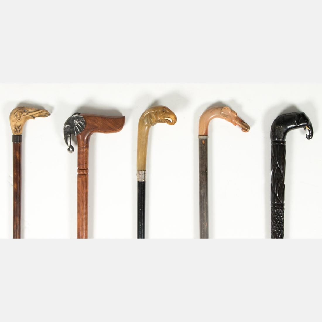 A Group of Five Carved Wood, Metal, Celluloid and Resin (1 of 14)